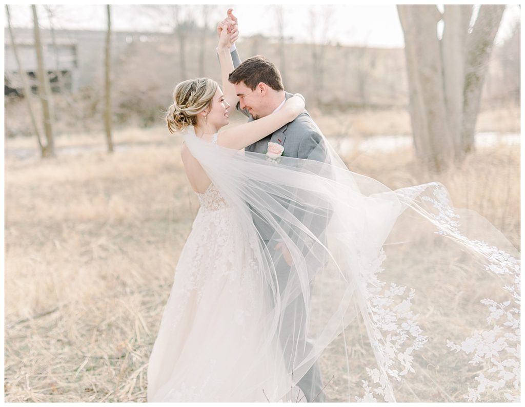 Taken by Wisconsin wedding photographer Alisha Marie Photography, specializes in Eau Claire wedding photographer, family photos Eau Claire wedding dress shop and image portrait in wisconsin and Stillwater minnesota rainy day wi wedding photographer evening portraits with bride and groom 