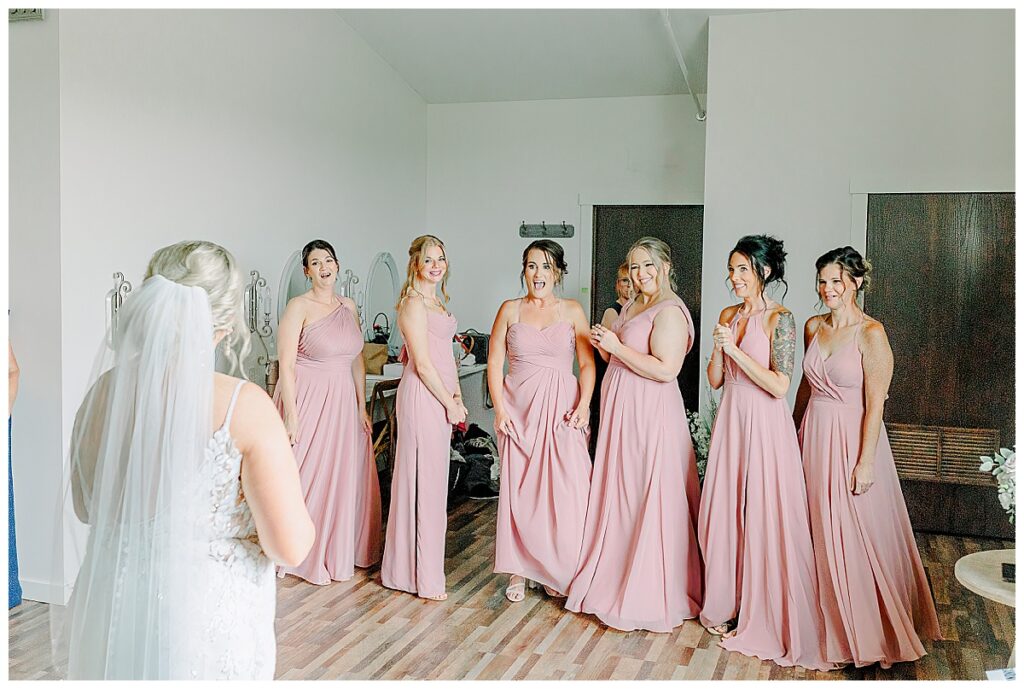lillydale dance hall in eau Claire Wisconsin using space for bridesmaids to do a first look during photography session