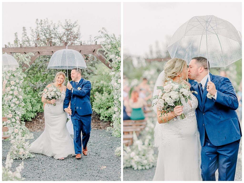wedding couple shares a first kiss in the rain at lillydale dance hall in Chippewa falls Wisconsin