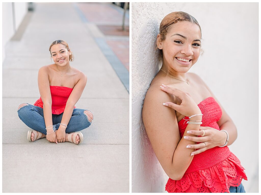 Senior Photographer Eau Claire in downtown taken by Alisha Marie Photography  near a white wall