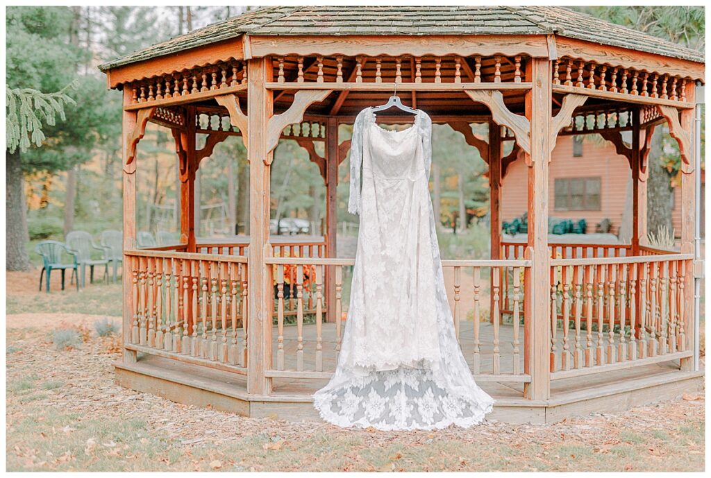 Lake Wissota Fall wedding photography taken by Alisha Marie Photography Detail Image of bride lace wedding dress