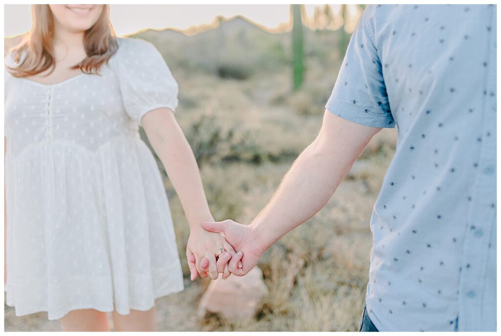 Usery Mountain Regional Park outside of Phoenix Arizona Close up of couple holding hands, engagement portraits and pose ideas. 