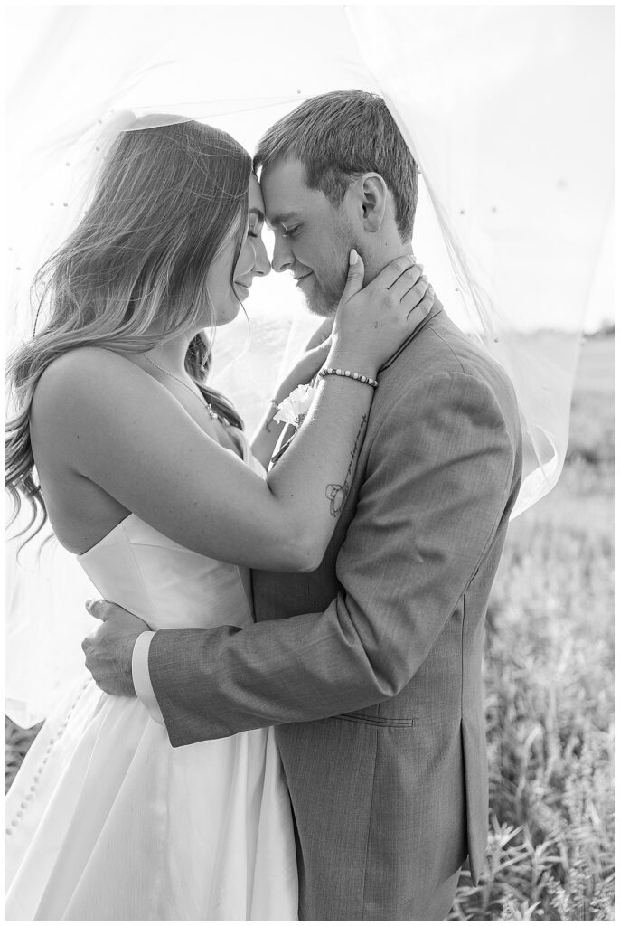 bride and groom in black and white photo taken at Lilydale- wisconsin wedding venue, Photography by Alisha Marie Photography